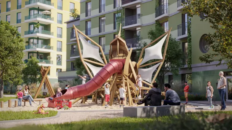 Spielplatz mit einer Drachenrutsche und verschiedenen Spielgeräten für Kinder.